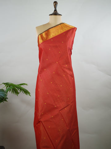 Kanchipuram Silk Pure silk in vibrant orange Vairavoosi weave with delicate buttas on the body.
Paired with a rich pallu and a matching Vairavoosi blouse.
Accented with a traditional kaddi border for timeless elegance. Shakti - Manoranjitham Weaves - Handloom Store