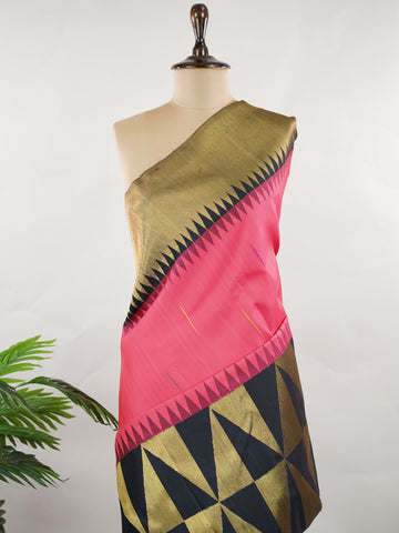 Kanchipuram Silk A stunning blend of vibrance and tradition, this magenta pink and mustard Kanjivaram saree is crafted in luxurious 100% pure silk. Adorned with elegant parrot buttis across the body, it beautifully reflects classic South Indian artistry. The bold contrast adds festive grandeur, making it a perfect pick for weddings and special celebrations. Karunamayi - Mustard Pure Kanjivaram Silk Saree - Manoranjitham Weaves - Handloom Store