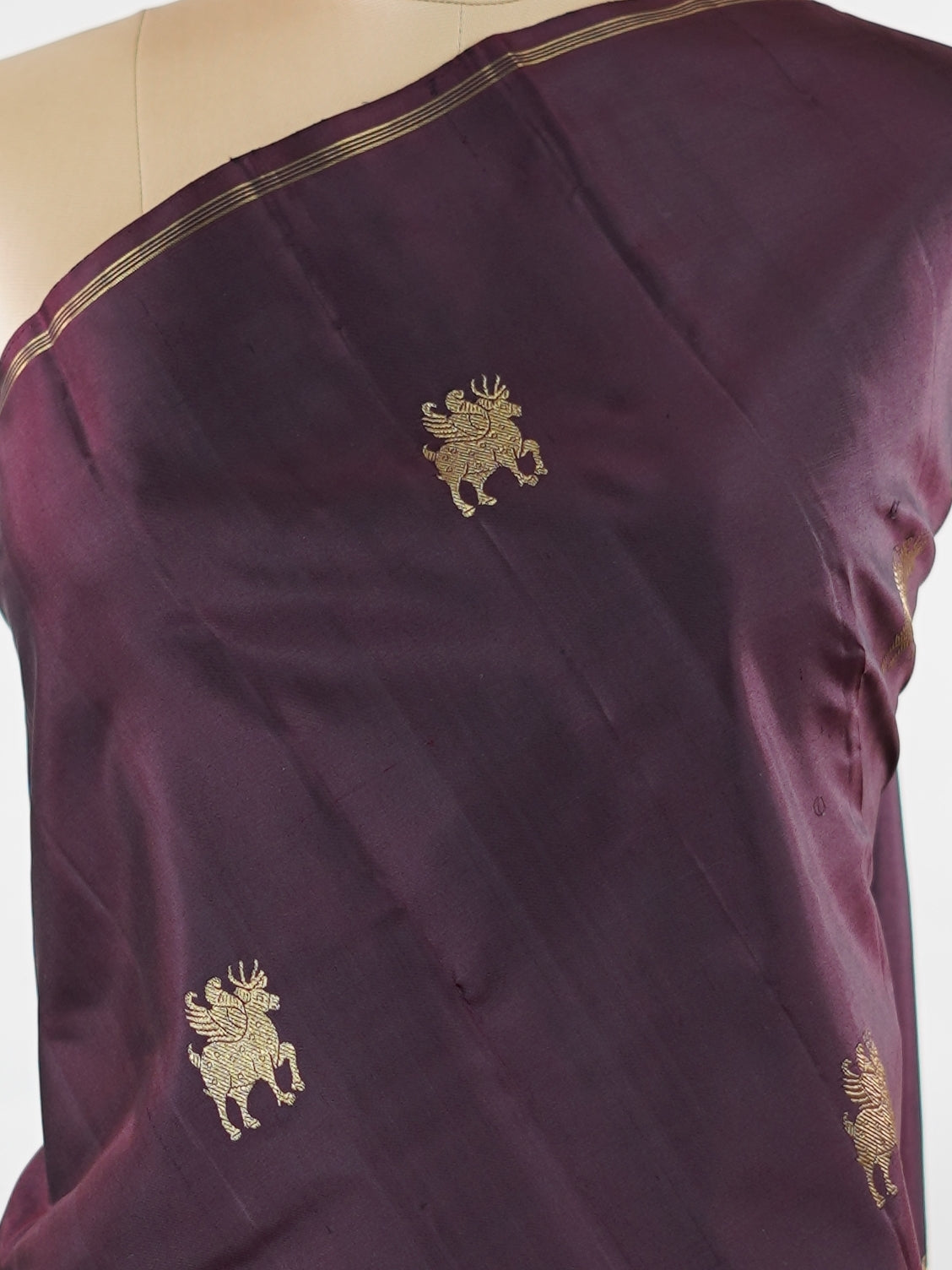Kanchipuram Silk Rich and earthy, this snuff-toned Kanjivaram saree is crafted in luxurious 100% pure silk for a graceful, structured drape. The body is adorned with elegant buttas that add depth and traditional charm to the weave. Subtle yet regal, it’s a timeless choice for weddings, festive occasions, and classic celebrations. Adishakti - Pure Kanjivaram Silk Saree | Pure Zari - Manoranjitham Weaves - Handloom Store