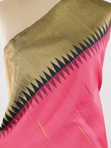 Kanchipuram Silk A stunning blend of vibrance and tradition, this magenta pink and mustard Kanjivaram saree is crafted in luxurious 100% pure silk. Adorned with elegant parrot buttis across the body, it beautifully reflects classic South Indian artistry. The bold contrast adds festive grandeur, making it a perfect pick for weddings and special celebrations. Karunamayi - Mustard Pure Kanjivaram Silk Saree - Manoranjitham Weaves - Handloom Store