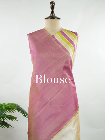 Kanchipuram Silk Soft, elegant, and timeless, this cream Kanjivaram saree is crafted in luxurious 100% pure silk for a graceful drape. The vibrant 8-kol multi-colour detailing adds festive richness, while delicate Malli Mogga buttis enhance the body with subtle floral charm. A perfect harmony of tradition and colour—ideal for weddings and special celebrations. Srishti - Manoranjitham Weaves - Handloom Store