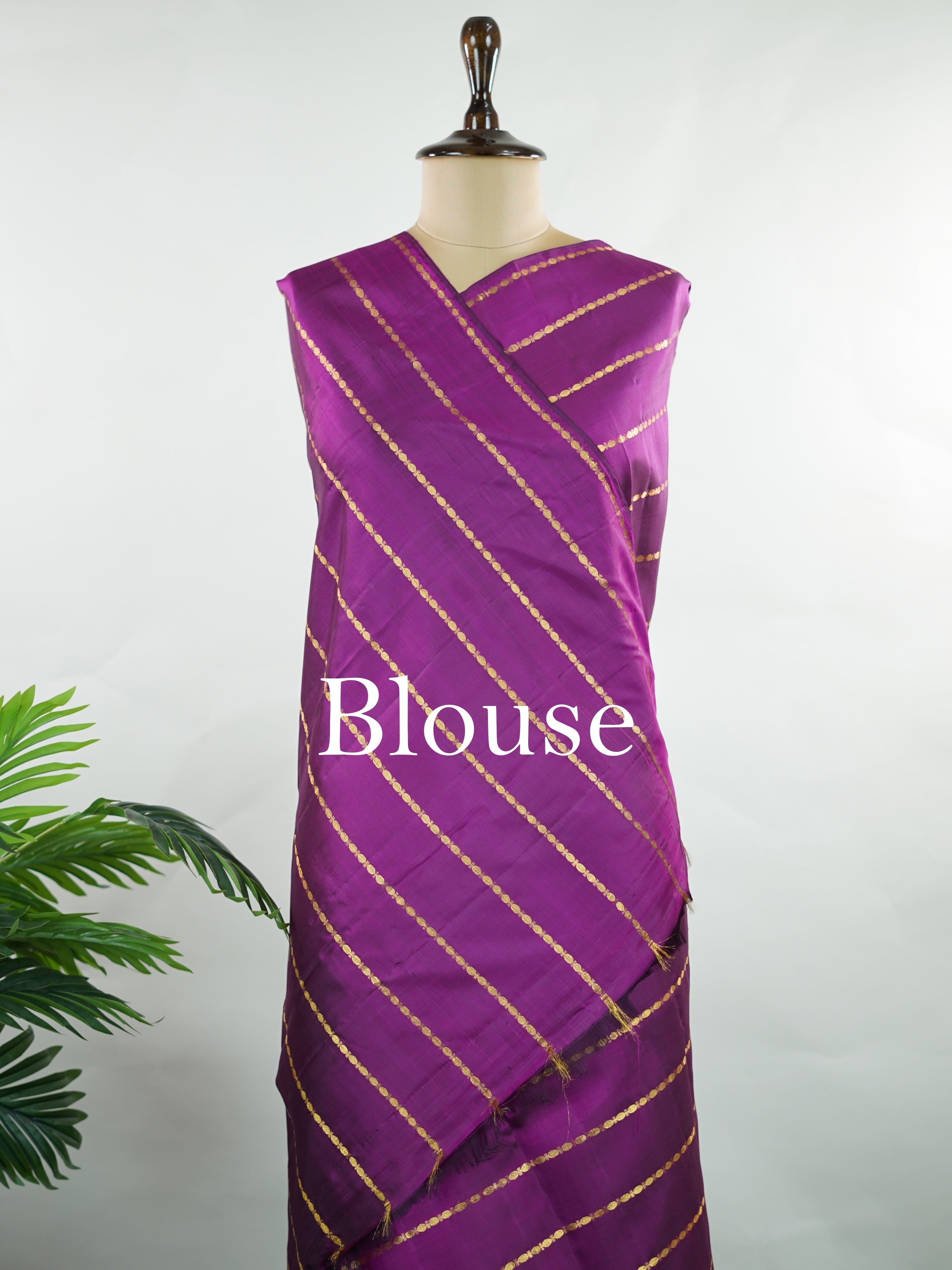Kanchipuram Silk Bold and contemporary, this magenta pink Kanjivaram saree is woven in rich pure silk with classic Veldhari detailing. Designed without a border, it offers a seamless, modern aesthetic while retaining timeless heritage appeal. A perfect statement piece for festive elegance. Sarvamangala - Pink Pure Kanjivaram Silk Saree | Veldhari Weave - Manoranjitham Weaves - Handloom Store