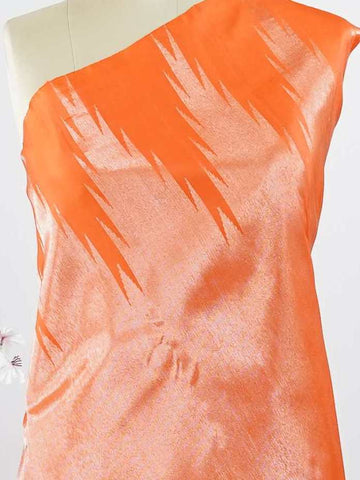 Kanchipuram Silk Striking and festive, this orange Kanjivaram saree is enhanced with rich purple contrast and detailed 8-kol borders. The luxurious silk drape and vibrant colour pairing make it an ideal choice for weddings and grand celebrations. Keertana - Orange Pure Kanjivaram Silk Saree - Manoranjitham Weaves - Handloom Store