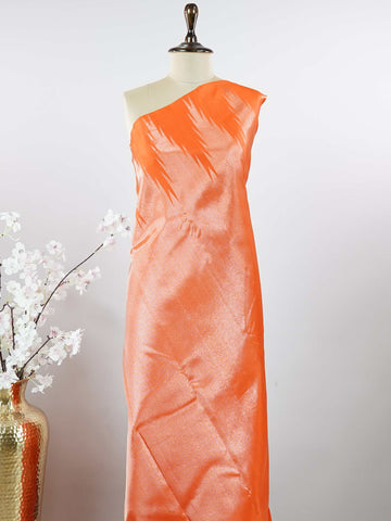 Kanchipuram Silk Striking and festive, this orange Kanjivaram saree is enhanced with rich purple contrast and detailed 8-kol borders. The luxurious silk drape and vibrant colour pairing make it an ideal choice for weddings and grand celebrations. Keertana - Orange Pure Kanjivaram Silk Saree - Manoranjitham Weaves - Handloom Store