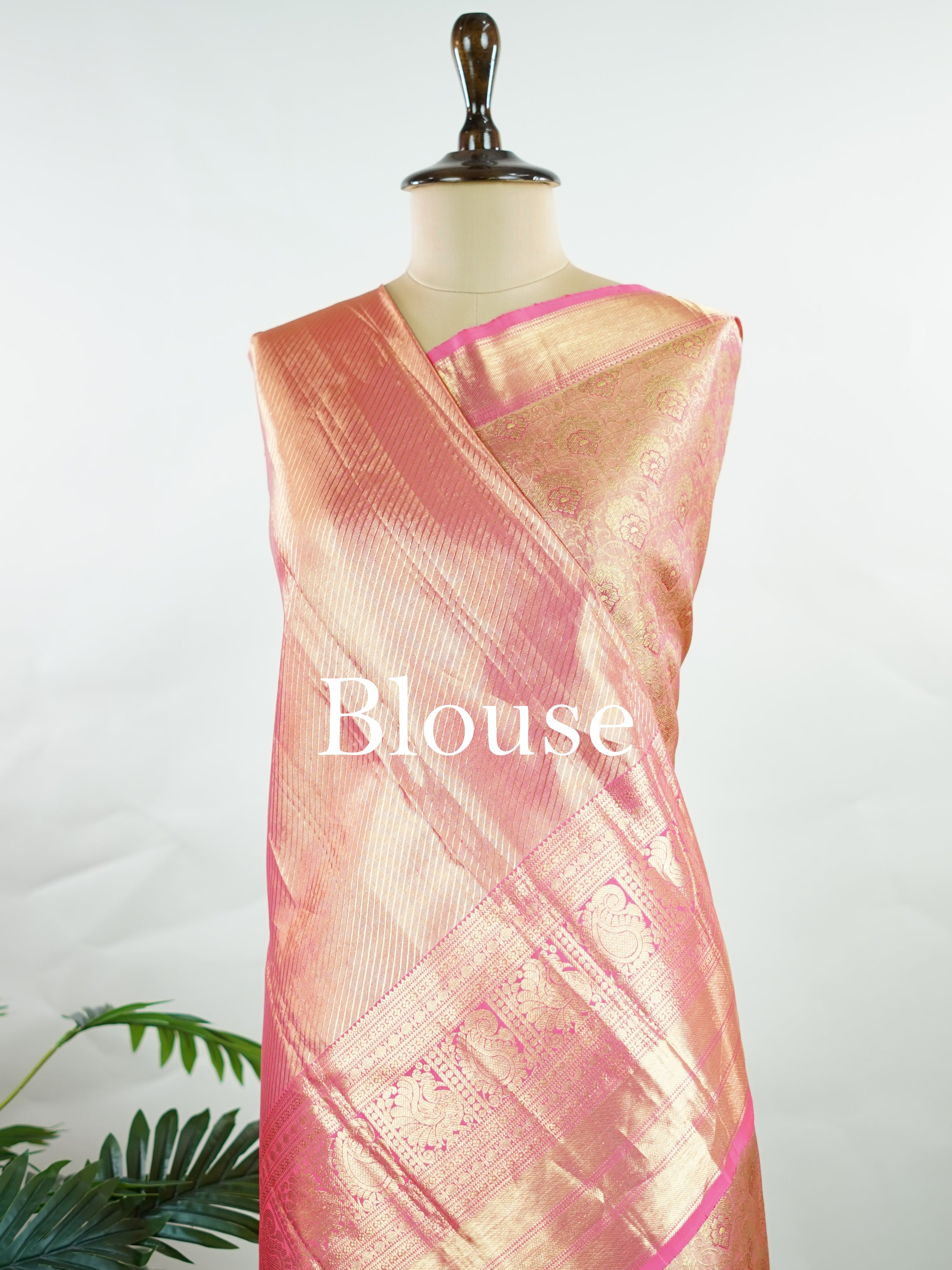 Kanchipuram Silk This Kanjivaram silk saree, adorned in Blush pink and detailed with Pure Zari weaving, reflects the grandeur of Kanchipuram. The timeless Buttis motifs enhance its bridal charm. A perfect blend of luxury and tradition, it is designed for those who appreciate fine craftsmanship. Sriranjani - Blush Pink Pure Kanjivaram Silk Saree | Pure Zari - Manoranjitham Weaves - Handloom Store