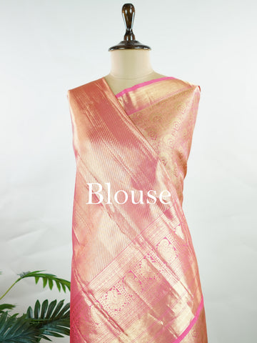 Kanchipuram Silk This Kanjivaram silk saree, adorned in Blush pink and detailed with Pure Zari weaving, reflects the grandeur of Kanchipuram. The timeless Buttis motifs enhance its bridal charm. A perfect blend of luxury and tradition, it is designed for those who appreciate fine craftsmanship. Sriranjani - Blush Pink Pure Kanjivaram Silk Saree | Pure Zari - Manoranjitham Weaves - Handloom Store