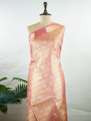 Kanchipuram Silk This Kanjivaram silk saree, adorned in Blush pink and detailed with Pure Zari weaving, reflects the grandeur of Kanchipuram. The timeless Buttis motifs enhance its bridal charm. A perfect blend of luxury and tradition, it is designed for those who appreciate fine craftsmanship. Sriranjani - Blush Pink Pure Kanjivaram Silk Saree | Pure Zari - Manoranjitham Weaves - Handloom Store