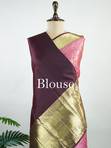Kanchipuram Silk A masterpiece from Kanchipuram, this Kanjivaram saree in Soft pink  is a tribute to India's rich handloom legacy. The Pure Zari weaving and Buttis motifs make it a perfect choice for brides and celebrations. Every thread speaks of elegance, tradition, and the skilled hands that bring this saree to life. Keeravani - Pink Pure Kanjivaram Silk Saree | Pure Zari - Manoranjitham Weaves - Handloom Store