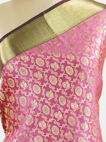 Kanchipuram Silk A masterpiece from Kanchipuram, this Kanjivaram saree in Soft pink  is a tribute to India's rich handloom legacy. The Pure Zari weaving and Buttis motifs make it a perfect choice for brides and celebrations. Every thread speaks of elegance, tradition, and the skilled hands that bring this saree to life. Keeravani - Pink Pure Kanjivaram Silk Saree | Pure Zari - Manoranjitham Weaves - Handloom Store