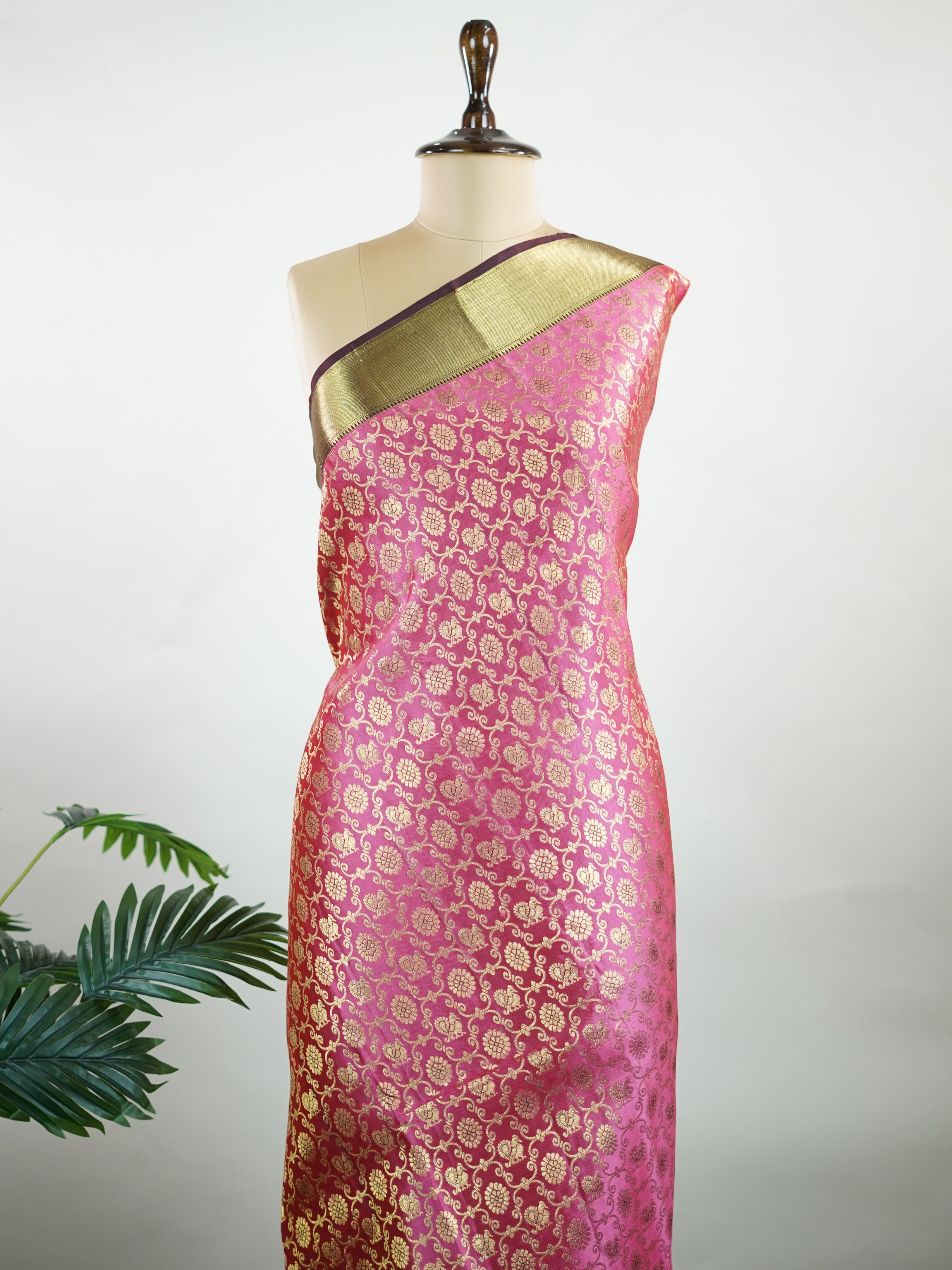 Kanchipuram Silk A masterpiece from Kanchipuram, this Kanjivaram saree in Soft pink  is a tribute to India's rich handloom legacy. The Pure Zari weaving and Buttis motifs make it a perfect choice for brides and celebrations. Every thread speaks of elegance, tradition, and the skilled hands that bring this saree to life. Keeravani - Pink Pure Kanjivaram Silk Saree | Pure Zari - Manoranjitham Weaves - Handloom Store