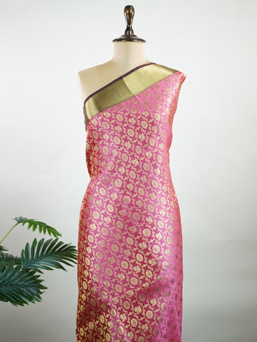 Kanchipuram Silk A masterpiece from Kanchipuram, this Kanjivaram saree in Soft pink  is a tribute to India's rich handloom legacy. The Pure Zari weaving and Buttis motifs make it a perfect choice for brides and celebrations. Every thread speaks of elegance, tradition, and the skilled hands that bring this saree to life. Keeravani - Pink Pure Kanjivaram Silk Saree | Pure Zari - Manoranjitham Weaves - Handloom Store