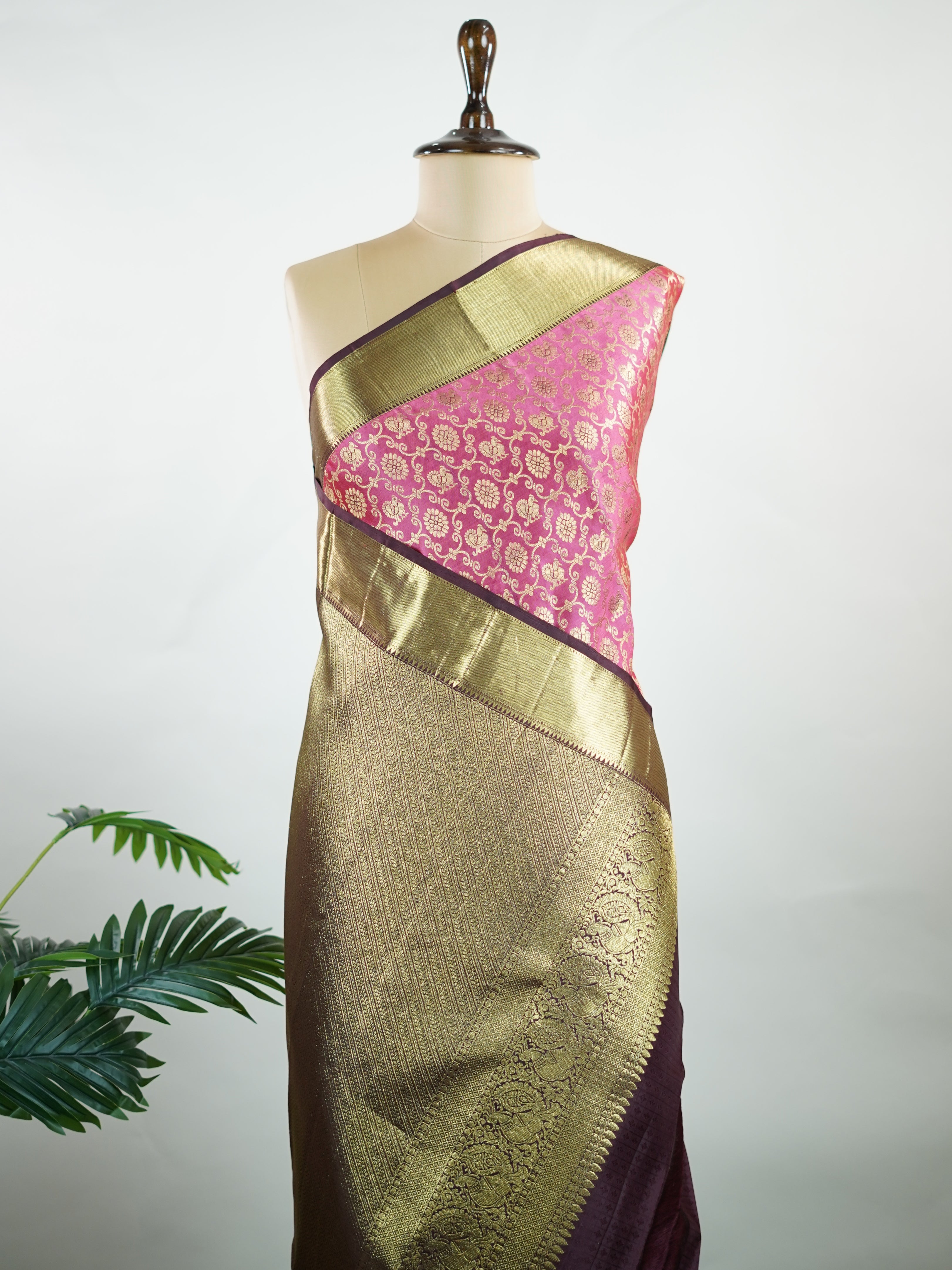 Kanchipuram Silk A masterpiece from Kanchipuram, this Kanjivaram saree in Soft pink  is a tribute to India's rich handloom legacy. The Pure Zari weaving and Buttis motifs make it a perfect choice for brides and celebrations. Every thread speaks of elegance, tradition, and the skilled hands that bring this saree to life. Keeravani - Pink Pure Kanjivaram Silk Saree | Pure Zari - Manoranjitham Weaves - Handloom Store