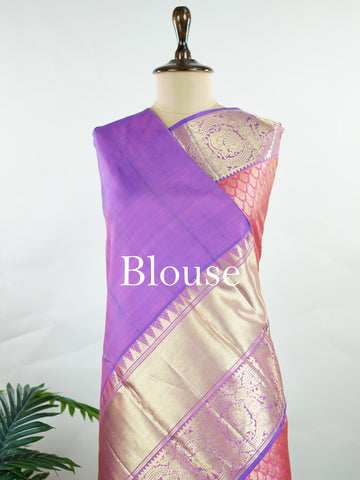 Kanchipuram Silk A masterpiece from Kanchipuram, this Kanjivaram saree in Hot Pink is a tribute to India's rich handloom legacy. The Pure Zari weaving and Buttis motifs make it a perfect choice for brides and celebrations. Every thread speaks of elegance, tradition, and the skilled hands that bring this saree to life. Bhairavi - Manoranjitham Weaves - Handloom Store