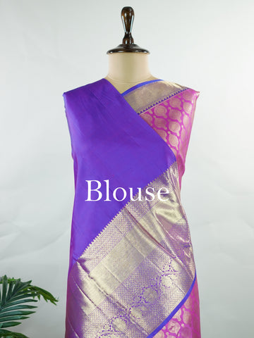 Kanchipuram Silk A masterpiece from Kanchipuram, this Kanjivaram saree in Pink is a tribute to India's rich handloom legacy. The Pure Zari weaving and Buttis motifs make it a perfect choice for brides and celebrations. Every thread speaks of elegance, tradition, and the skilled hands that bring this saree to life. Dwijavanthi - Manoranjitham Weaves - Handloom Store