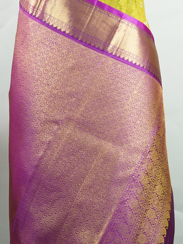 Kanchipuram Silk This Kanjivaram silk saree, adorned in Olive Green and detailed with Pure Zari weaving, reflects the grandeur of Kanchipuram. The timeless Buttis motifs enhance its bridal charm. A perfect blend of luxury and tradition, it is designed for those who appreciate fine craftsmanship. Sahana - Olive Pure Kanjivaram Silk Saree | Pure Zari - Manoranjitham Weaves - Handloom Store