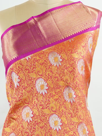 Kanchipuram Silk Handwoven by skilled artisans of Kanchipuram, this Kanjivaram saree in Orange blends traditional elegance with intricate Pure Zari zari work. A truly stunning drape for special occasions. The interplay of colors and craftsmanship makes it a treasured piece for every saree connoisseur. Suratia - Orange Pure Kanjivaram Silk Saree | Pure Zari - Manoranjitham Weaves - Handloom Store