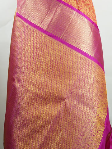 Kanchipuram Silk Handwoven by skilled artisans of Kanchipuram, this Kanjivaram saree in Orange blends traditional elegance with intricate Pure Zari zari work. A truly stunning drape for special occasions. The interplay of colors and craftsmanship makes it a treasured piece for every saree connoisseur. Suratia - Orange Pure Kanjivaram Silk Saree | Pure Zari - Manoranjitham Weaves - Handloom Store