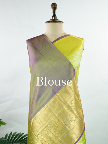 Kanchipuram Silk A masterpiece from Kanchipuram, this Kanjivaram saree in Green is a tribute to India's rich handloom legacy. The Pure Zari weaving and Buttis motifs make it a perfect choice for brides and celebrations. Every thread speaks of elegance, tradition, and the skilled hands that bring this saree to life. Sindhu - Manoranjitham Weaves - Handloom Store