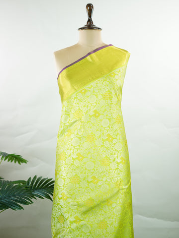 Kanchipuram Silk A masterpiece from Kanchipuram, this Kanjivaram saree in Green is a tribute to India's rich handloom legacy. The Pure Zari weaving and Buttis motifs make it a perfect choice for brides and celebrations. Every thread speaks of elegance, tradition, and the skilled hands that bring this saree to life. Sindhu - Manoranjitham Weaves - Handloom Store