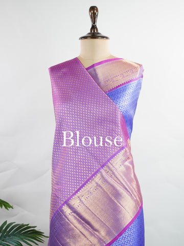 Kanchipuram Silk A masterpiece from Kanchipuram, this Kanjivaram saree in Royal Blue is a tribute to India's rich handloom legacy. The Pure Zari weaving and Buttis motifs make it a perfect choice for brides and celebrations. Every thread speaks of elegance, tradition, and the skilled hands that bring this saree to life. Bilaharia - Royal Blue Pure Kanjivaram Silk Saree | Pure Zari - Manoranjitham Weaves - Handloom Store