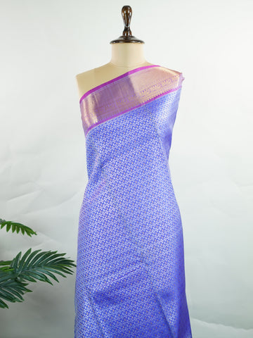 Kanchipuram Silk A masterpiece from Kanchipuram, this Kanjivaram saree in Royal Blue is a tribute to India's rich handloom legacy. The Pure Zari weaving and Buttis motifs make it a perfect choice for brides and celebrations. Every thread speaks of elegance, tradition, and the skilled hands that bring this saree to life. Bilaharia - Royal Blue Pure Kanjivaram Silk Saree | Pure Zari - Manoranjitham Weaves - Handloom Store