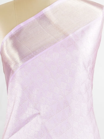 Kanchipuram Silk Handwoven by skilled artisans of Kanchipuram, this Kanjivaram saree in Peach Pink blends traditional elegance with intricate Pure Zari zari work. A truly stunning drape for special occasions. The interplay of colors and craftsmanship makes it a treasured piece for every saree connoisseur. Charukesi - Peach Pure Kanjivaram Silk Saree | Pure Zari - Manoranjitham Weaves - Handloom Store