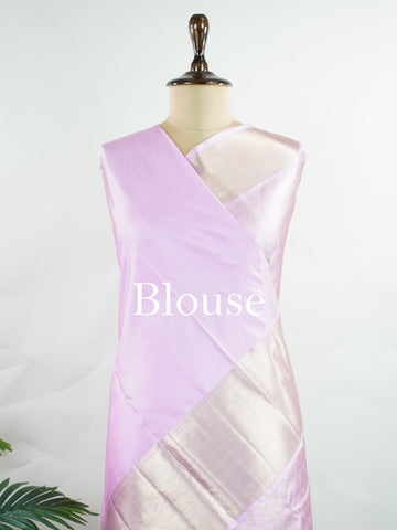 Kanchipuram Silk Handwoven by skilled artisans of Kanchipuram, this Kanjivaram saree in Peach Pink blends traditional elegance with intricate Pure Zari zari work. A truly stunning drape for special occasions. The interplay of colors and craftsmanship makes it a treasured piece for every saree connoisseur. Charukesi - Peach Pure Kanjivaram Silk Saree | Pure Zari - Manoranjitham Weaves - Handloom Store