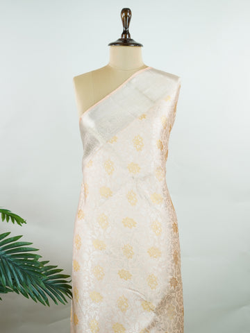 Kanchipuram Silk A masterpiece from Kanchipuram, this Kanjivaram saree in Ivory is a tribute to India's rich handloom legacy. The Pure Zari weaving and Buttis motifs make it a perfect choice for brides and celebrations. Every thread speaks of elegance, tradition, and the skilled hands that bring this saree to life. Hamsadhwani - Ivory Pure Kanjivaram Silk Saree | Pure Zari - Manoranjitham Weaves - Handloom Store