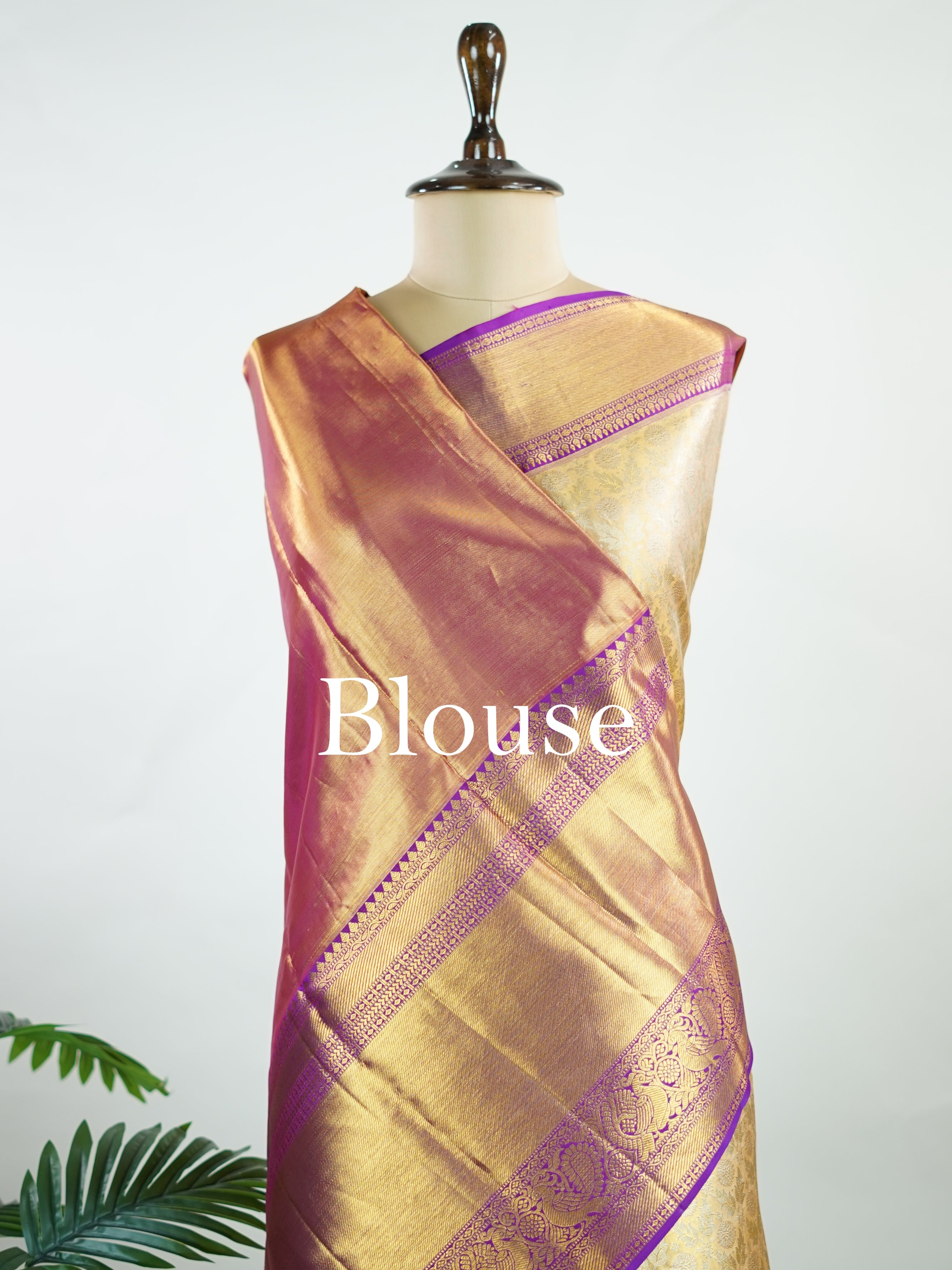 Kanchipuram Silk A masterpiece from Kanchipuram, this Kanjivaram saree in Golden Yellow is a tribute to India's rich handloom legacy. The Pure Zari weaving and Buttis motifs make it a perfect choice for brides and celebrations. Every thread speaks of elegance, tradition, and the skilled hands that bring this saree to life. Latangi - Pure Kanjivaram Silk Saree | Pure Zari - Manoranjitham Weaves - Handloom Store