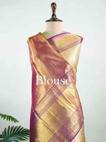 Kanchipuram Silk A masterpiece from Kanchipuram, this Kanjivaram saree in Golden Yellow is a tribute to India's rich handloom legacy. The Pure Zari weaving and Buttis motifs make it a perfect choice for brides and celebrations. Every thread speaks of elegance, tradition, and the skilled hands that bring this saree to life. Latangi - Pure Kanjivaram Silk Saree | Pure Zari - Manoranjitham Weaves - Handloom Store