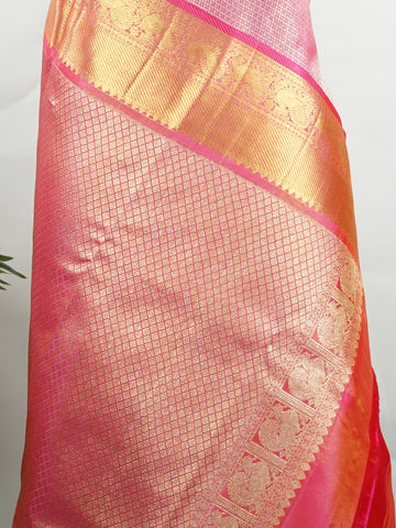 Kanchipuram Silk This 100% Pure Silk  silk saree, adorned in Hot Pink and detailed with Pure Zari weaving, reflects the grandeur of Maharashtra. The timeless Buttis motifs enhance its bridal charm. A perfect blend of luxury and tradition, it is designed for those who appreciate fine craftsmanship. Bageshree - Pure Kanjivaram Silk Saree | Pure Zari - Manoranjitham Weaves - Handloom Store