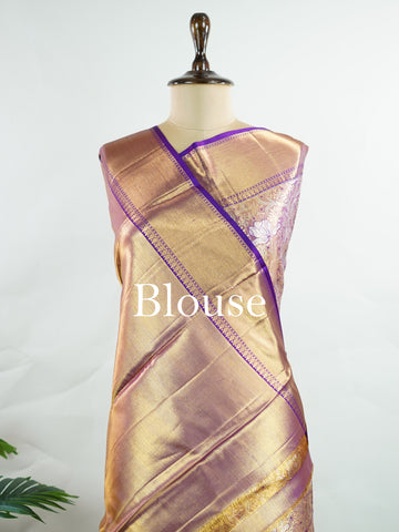 Kanchipuram Silk This 100% Pure Silk  silk saree, adorned in Coral  and detailed with Pure Zari weaving, reflects the grandeur of Maharashtra. The timeless Buttis motifs enhance its bridal charm. A perfect blend of luxury and tradition, it is designed for those who appreciate fine craftsmanship. Bhupali - Coral Pure Kanjivaram Silk Saree | Pure Zari - Manoranjitham Weaves - Handloom Store