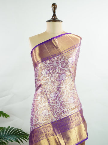 Kanchipuram Silk This 100% Pure Silk  silk saree, adorned in Coral  and detailed with Pure Zari weaving, reflects the grandeur of Maharashtra. The timeless Buttis motifs enhance its bridal charm. A perfect blend of luxury and tradition, it is designed for those who appreciate fine craftsmanship. Bhupali - Coral Pure Kanjivaram Silk Saree | Pure Zari - Manoranjitham Weaves - Handloom Store