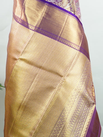 Kanchipuram Silk This 100% Pure Silk  silk saree, adorned in Coral  and detailed with Pure Zari weaving, reflects the grandeur of Maharashtra. The timeless Buttis motifs enhance its bridal charm. A perfect blend of luxury and tradition, it is designed for those who appreciate fine craftsmanship. Bhupali - Coral Pure Kanjivaram Silk Saree | Pure Zari - Manoranjitham Weaves - Handloom Store
