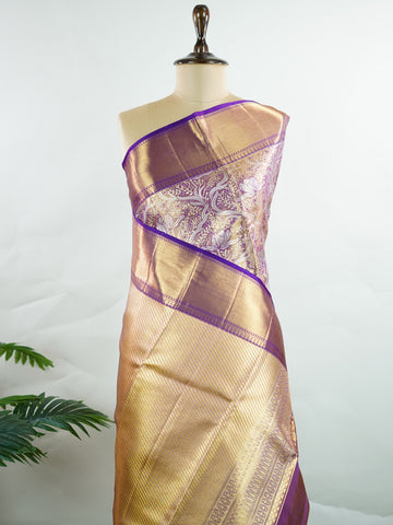Kanchipuram Silk This 100% Pure Silk  silk saree, adorned in Coral  and detailed with Pure Zari weaving, reflects the grandeur of Maharashtra. The timeless Buttis motifs enhance its bridal charm. A perfect blend of luxury and tradition, it is designed for those who appreciate fine craftsmanship. Bhupali - Coral Pure Kanjivaram Silk Saree | Pure Zari - Manoranjitham Weaves - Handloom Store