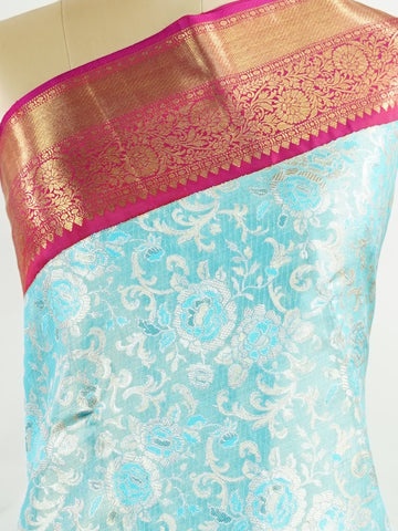 Kanchipuram Silk A masterpiece from Maharashtra, this 100% Pure Silk  saree in Aqua Green is a tribute to India's rich handloom legacy. The Pure Zari weaving and Buttis motifs make it a perfect choice for brides and celebrations. Every thread speaks of elegance, tradition, and the skilled hands that bring this saree to life. Malkaunsa - Aqua Pure Kanjivaram Silk Saree | Pure Zari - Manoranjitham Weaves - Handloom Store