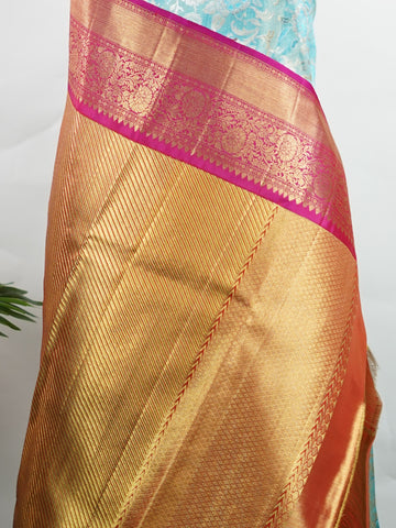 Kanchipuram Silk A masterpiece from Maharashtra, this 100% Pure Silk  saree in Aqua Green is a tribute to India's rich handloom legacy. The Pure Zari weaving and Buttis motifs make it a perfect choice for brides and celebrations. Every thread speaks of elegance, tradition, and the skilled hands that bring this saree to life. Malkaunsa - Aqua Pure Kanjivaram Silk Saree | Pure Zari - Manoranjitham Weaves - Handloom Store