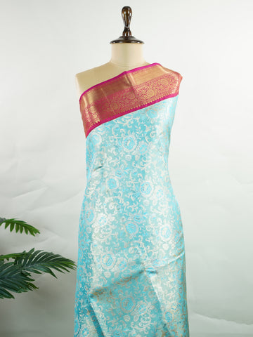 Kanchipuram Silk A masterpiece from Maharashtra, this 100% Pure Silk  saree in Aqua Green is a tribute to India's rich handloom legacy. The Pure Zari weaving and Buttis motifs make it a perfect choice for brides and celebrations. Every thread speaks of elegance, tradition, and the skilled hands that bring this saree to life. Malkaunsa - Aqua Pure Kanjivaram Silk Saree | Pure Zari - Manoranjitham Weaves - Handloom Store