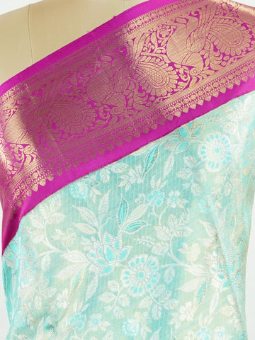 Kanchipuram Silk This 100% Pure Silk  silk saree, adorned in Lilac and detailed with Pure Zari weaving, reflects the grandeur of Maharashtra. The timeless Buttis motifs enhance its bridal charm. A perfect blend of luxury and tradition, it is designed for those who appreciate fine craftsmanship. Gorakh - Pure Kanjivaram Silk Saree | Pure Zari - Manoranjitham Weaves - Handloom Store