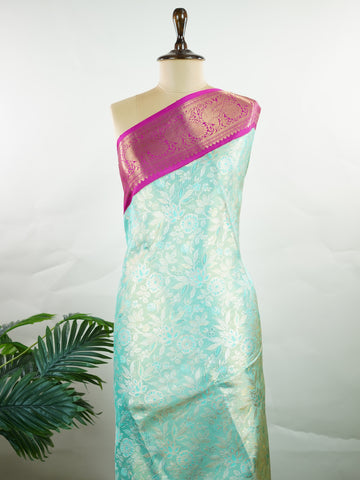 Kanchipuram Silk This 100% Pure Silk  silk saree, adorned in Lilac and detailed with Pure Zari weaving, reflects the grandeur of Maharashtra. The timeless Buttis motifs enhance its bridal charm. A perfect blend of luxury and tradition, it is designed for those who appreciate fine craftsmanship. Gorakh - Pure Kanjivaram Silk Saree | Pure Zari - Manoranjitham Weaves - Handloom Store