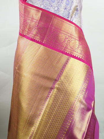 Kanchipuram Silk Handwoven by skilled artisans of Maharashtra, this 100% Pure Silk  saree in Lilac blends traditional elegance with intricate Pure Zari zari work. A truly stunning drape for special occasions. The interplay of colors and craftsmanship makes it a treasured piece for every saree connoisseur. Patdeepa - Pure Kanjivaram Silk Saree | Pure Zari - Manoranjitham Weaves - Handloom Store