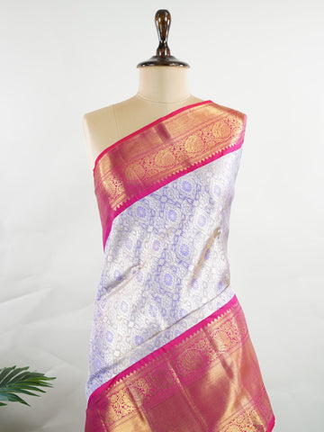Kanchipuram Silk Handwoven by skilled artisans of Maharashtra, this 100% Pure Silk  saree in Lilac blends traditional elegance with intricate Pure Zari zari work. A truly stunning drape for special occasions. The interplay of colors and craftsmanship makes it a treasured piece for every saree connoisseur. Patdeepa - Pure Kanjivaram Silk Saree | Pure Zari - Manoranjitham Weaves - Handloom Store