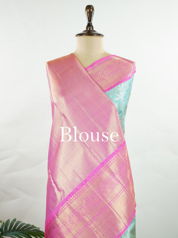Kanchipuram Silk Handwoven by skilled artisans of Maharashtra, this 100% Pure Silk  saree in Aqua Green blends traditional elegance with intricate Pure Zari zari work. A truly stunning drape for special occasions. The interplay of colors and craftsmanship makes it a treasured piece for every saree connoisseur. Joga - Aqua Pure Kanjivaram Silk Saree | Pure Zari - Manoranjitham Weaves - Handloom Store