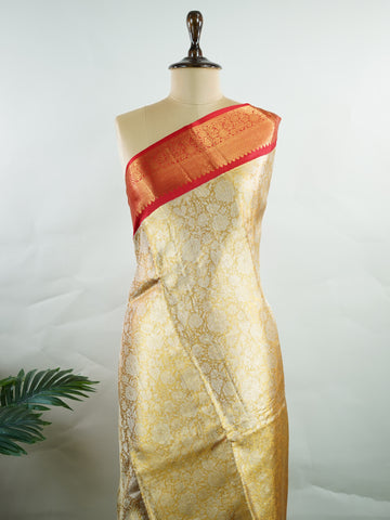 Kanchipuram Silk Handwoven by skilled artisans of Maharashtra, this 100% Pure Silk  saree in Mustard Yellow blends traditional elegance with intricate Pure Zari zari work. A truly stunning drape for special occasions. The interplay of colors and craftsmanship makes it a treasured piece for every saree connoisseur. Gaud - Mustard Yellow Pure Kanjivaram Silk Saree | Pure Zari - Manoranjitham Weaves - Handloom Store