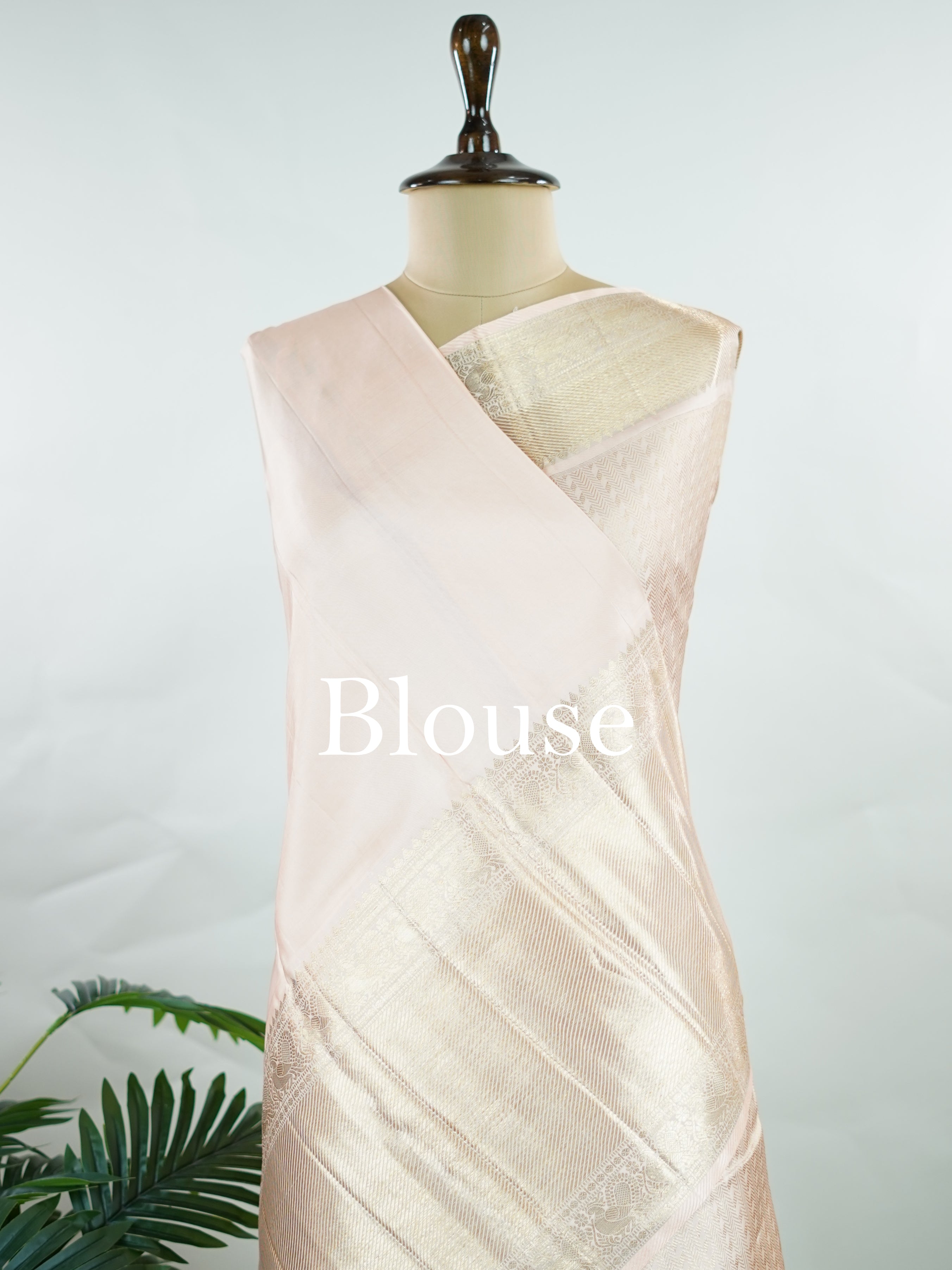 Kanchipuram Silk This 100% Pure Silk  silk saree, adorned in Peach and detailed with Pure Zari weaving, reflects the grandeur of Maharashtra. The timeless Buttis motifs enhance its bridal charm. A perfect blend of luxury and tradition, it is designed for those who appreciate fine craftsmanship. Rageshree - Peach Pure Kanjivaram Silk Saree | Pure Zari - Manoranjitham Weaves - Handloom Store