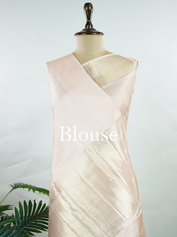 Kanchipuram Silk This 100% Pure Silk  silk saree, adorned in Peach and detailed with Pure Zari weaving, reflects the grandeur of Maharashtra. The timeless Buttis motifs enhance its bridal charm. A perfect blend of luxury and tradition, it is designed for those who appreciate fine craftsmanship. Rageshree - Peach Pure Kanjivaram Silk Saree | Pure Zari - Manoranjitham Weaves - Handloom Store
