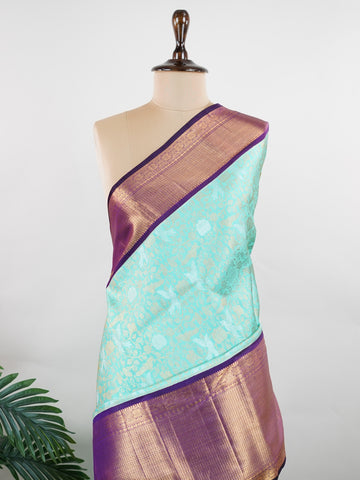 Kanchipuram Silk Kanjivaram silks are the crown jewels of South Indian weaving, renowned for their rich texture, vibrant colors, and exquisite zari work. Handwoven in Kanchipuram, these silks combine the finest mulberry silk with pure gold and silver threads, creating opulent sarees fit for weddings and grand celebrations. Each piece tells a story of tradition, craftsmanship, and timeless elegance. Natabhairavi - Pure Kanjivaram Silk Saree | Pure Zari - Manoranjitham Weaves - Handloom Store