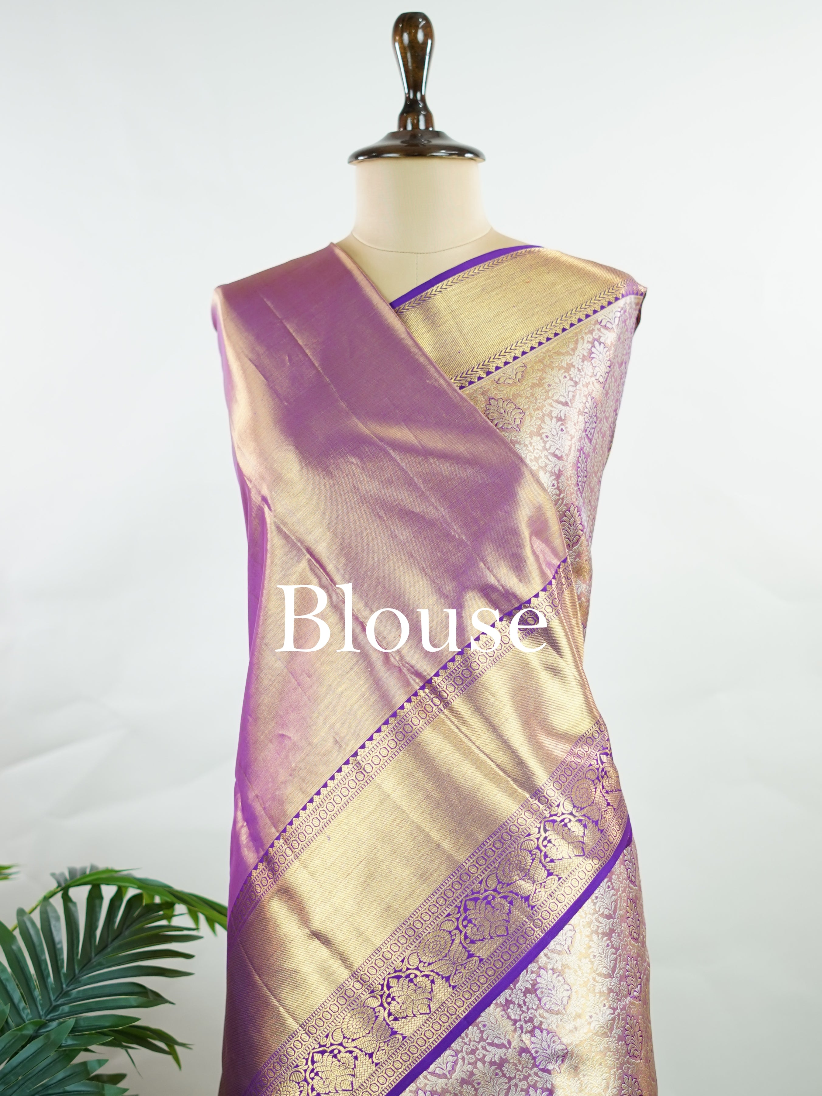 Kanchipuram Silk Beautiful bridal Kanjivaram Tissue saree featuring a luminous Lavender body, gracefully complemented by a matching Lavender border and elegant pallu. The delicate tissue weave adds a radiant shimmer, enhancing the saree’s luxurious and ethereal appeal. Expertly crafted with timeless Kanjivaram artistry, this drape exudes sophistication, grace, and bridal elegance. Paired with a matching Tissue Lavender blouse, it is a perfect choice for weddings, receptions, and grand celebrations. Ishvika 