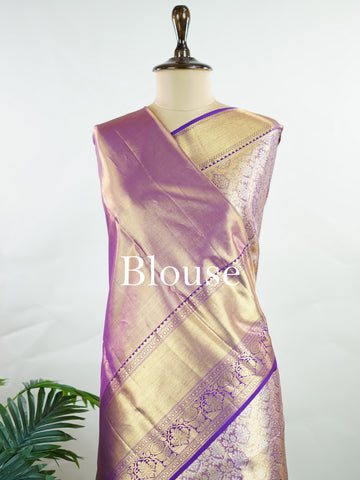 Kanchipuram Silk Beautiful bridal Kanjivaram Tissue saree featuring a luminous Lavender body, gracefully complemented by a matching Lavender border and elegant pallu. The delicate tissue weave adds a radiant shimmer, enhancing the saree’s luxurious and ethereal appeal. Expertly crafted with timeless Kanjivaram artistry, this drape exudes sophistication, grace, and bridal elegance. Paired with a matching Tissue Lavender blouse, it is a perfect choice for weddings, receptions, and grand celebrations. Ishvika 
