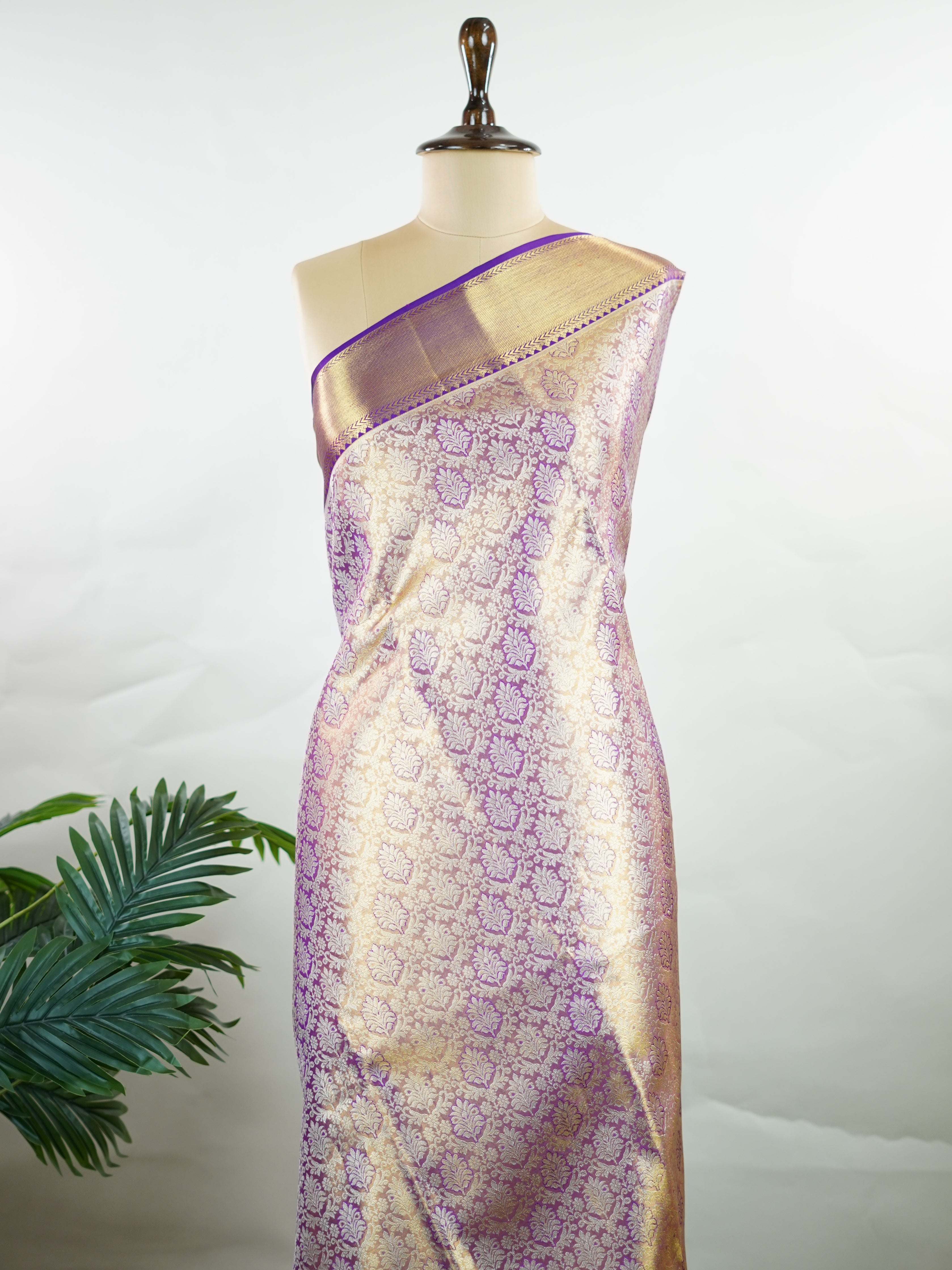 Kanchipuram Silk Beautiful bridal Kanjivaram Tissue saree featuring a luminous Lavender body, gracefully complemented by a matching Lavender border and elegant pallu. The delicate tissue weave adds a radiant shimmer, enhancing the saree’s luxurious and ethereal appeal. Expertly crafted with timeless Kanjivaram artistry, this drape exudes sophistication, grace, and bridal elegance. Paired with a matching Tissue Lavender blouse, it is a perfect choice for weddings, receptions, and grand celebrations. Ishvika 